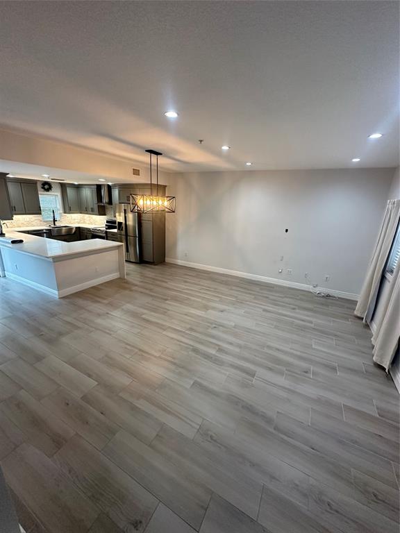 445 Northeast 1st Street Pompano Beach, FL 33060 - Photo 3 of 24 a view of kitchen with refrigerator microwave and stove