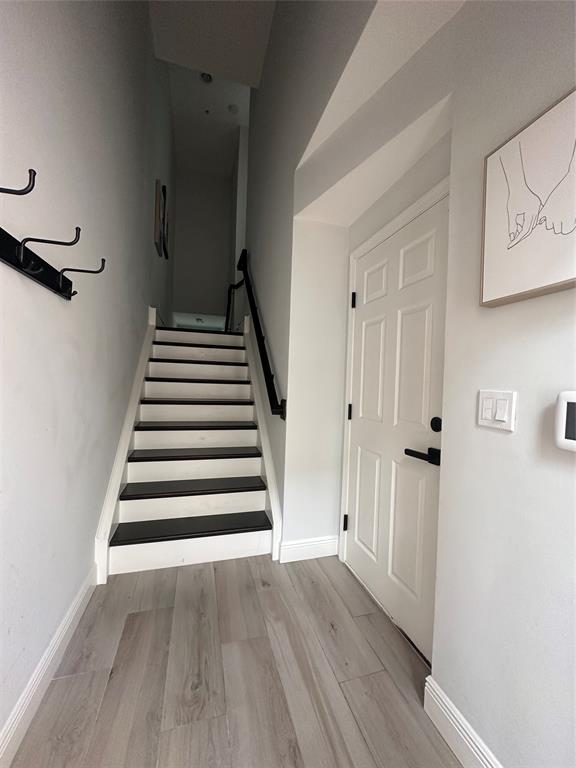 445 Northeast 1st Street Pompano Beach, FL 33060 - Photo 7 of 24 a view of a hallway with wooden floor and entryway