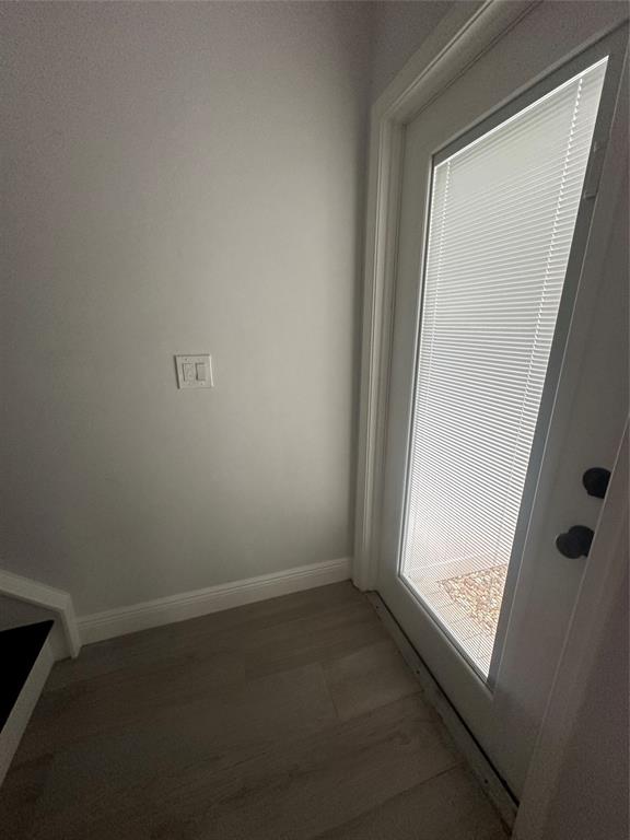 445 Northeast 1st Street Pompano Beach, FL 33060 - Photo 9 of 24 an empty room with windows