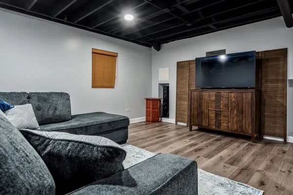 a bedroom with bed and a window