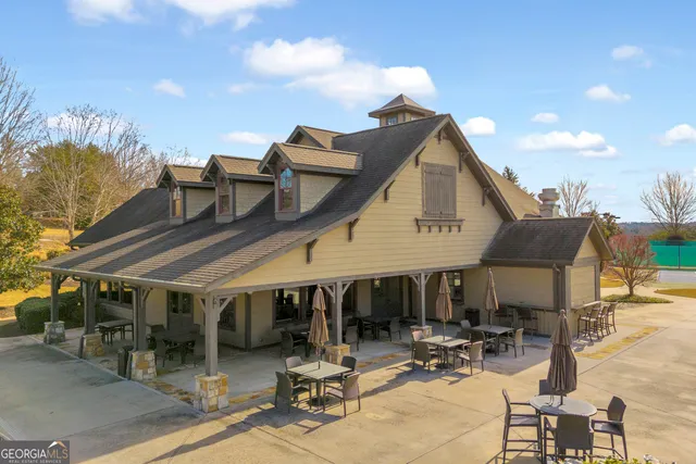 a front view of a house with swimming pool