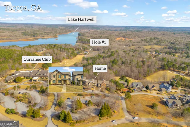a view of a swimming pool with an ocean view
