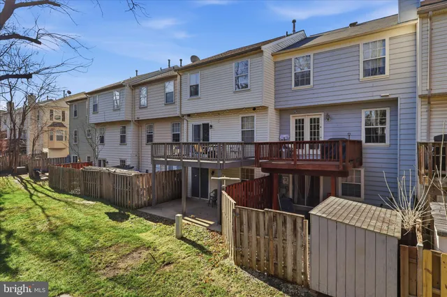 a front view of a house with balcony and patio