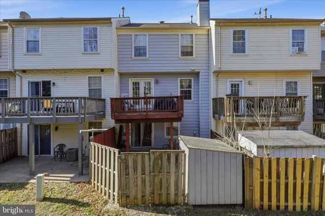 a sign that is sitting on a wooden floor