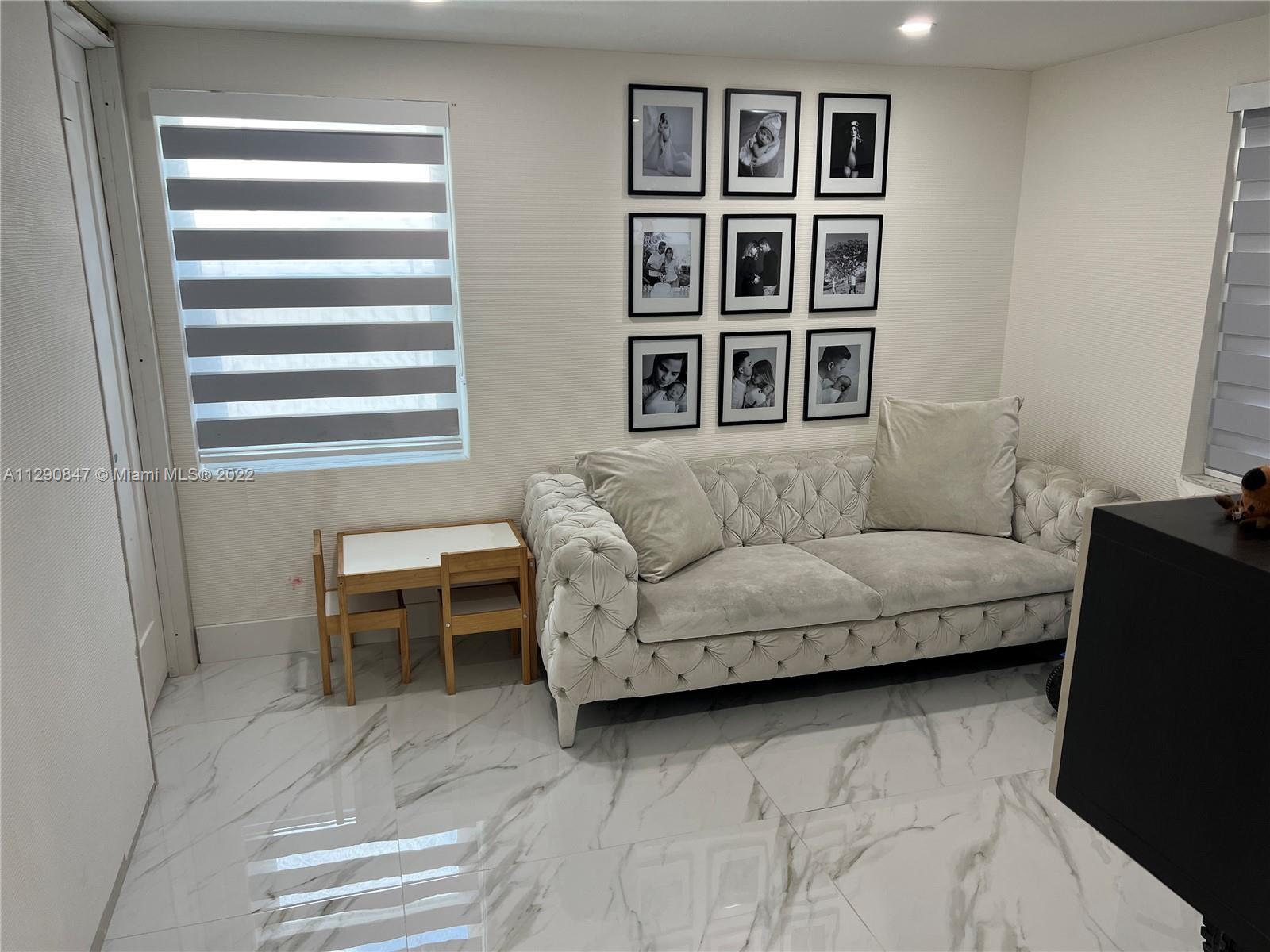 17841 Southwest 113th Avenue Miami, FL 33157 - Photo 17 of 20 a living room with furniture and a window