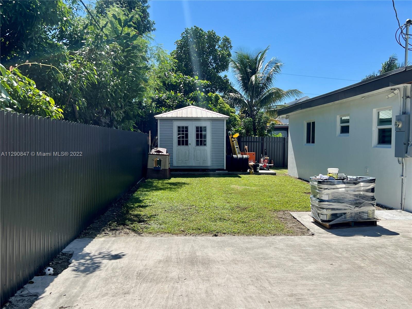 17841 Southwest 113th Avenue Miami, FL 33157 - Photo 19 of 20 a front view of house with yard and outdoor seating