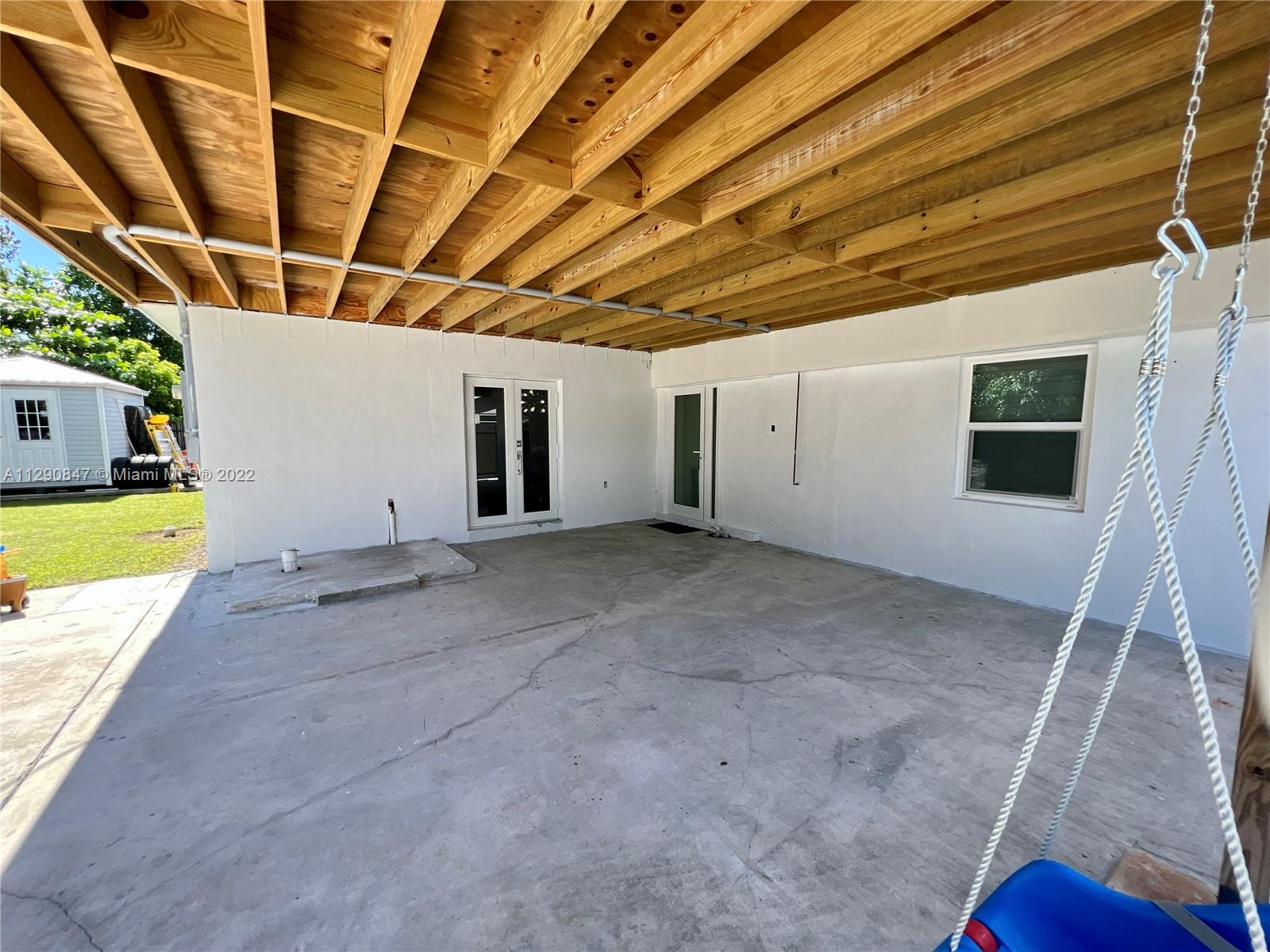 17841 Southwest 113th Avenue Miami, FL 33157 - Photo 9 of 20 a view of a room with wooden stairs