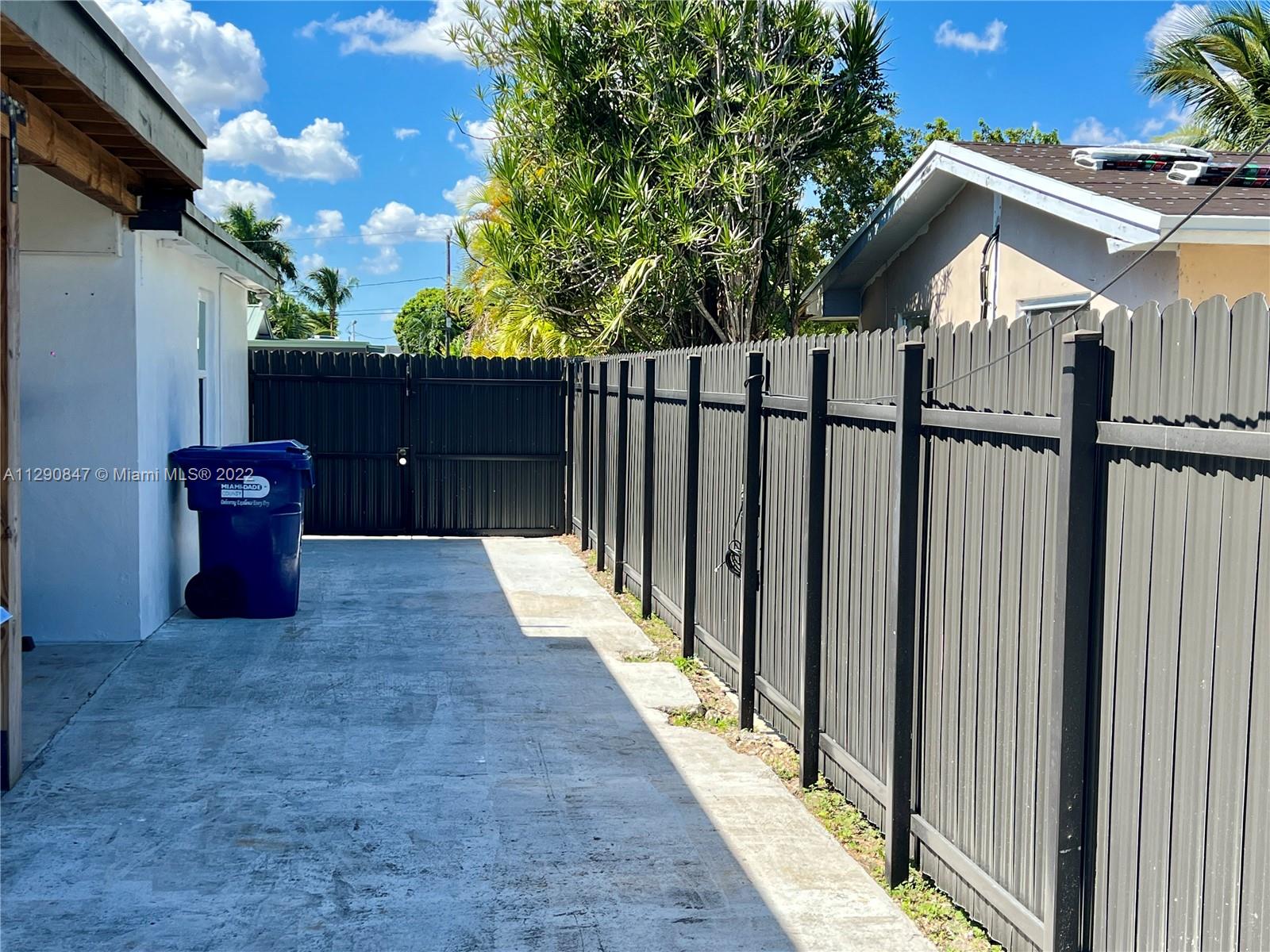 17841 Southwest 113th Avenue Miami, FL 33157 - Photo 10 of 20 a view of a house with a backyard