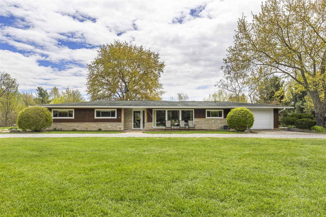 6039 Mick Road Benzonia, MI 49616 - Photo 1 of 62