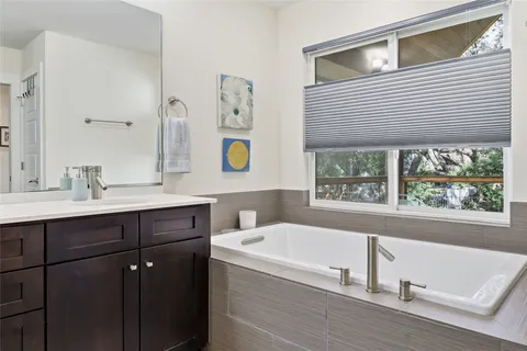 a bathroom with a sink and a bathtub