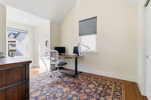 a living room with a couch and a table