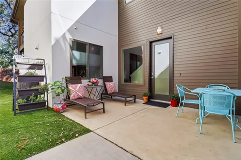 a view of a chairs in front of house