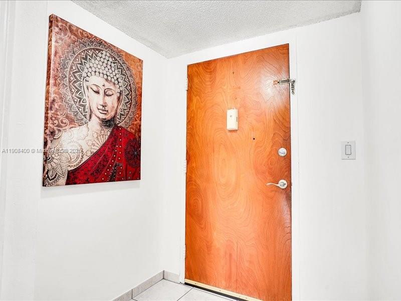 8990 Southwest 24th Street, Unit 33 Miami, FL 33165 - Photo 18 of 22 a bathroom with a window and a door