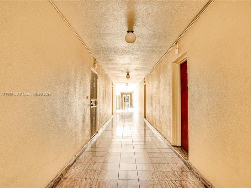 8990 Southwest 24th Street, Unit 33 Miami, FL 33165 - Photo 19 of 22 a view of a hallway