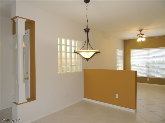 23891 Costa Del Sol Road, Unit 103 Bonita Springs, FL 34135 - Photo 3 of 12 a view of a room with a window