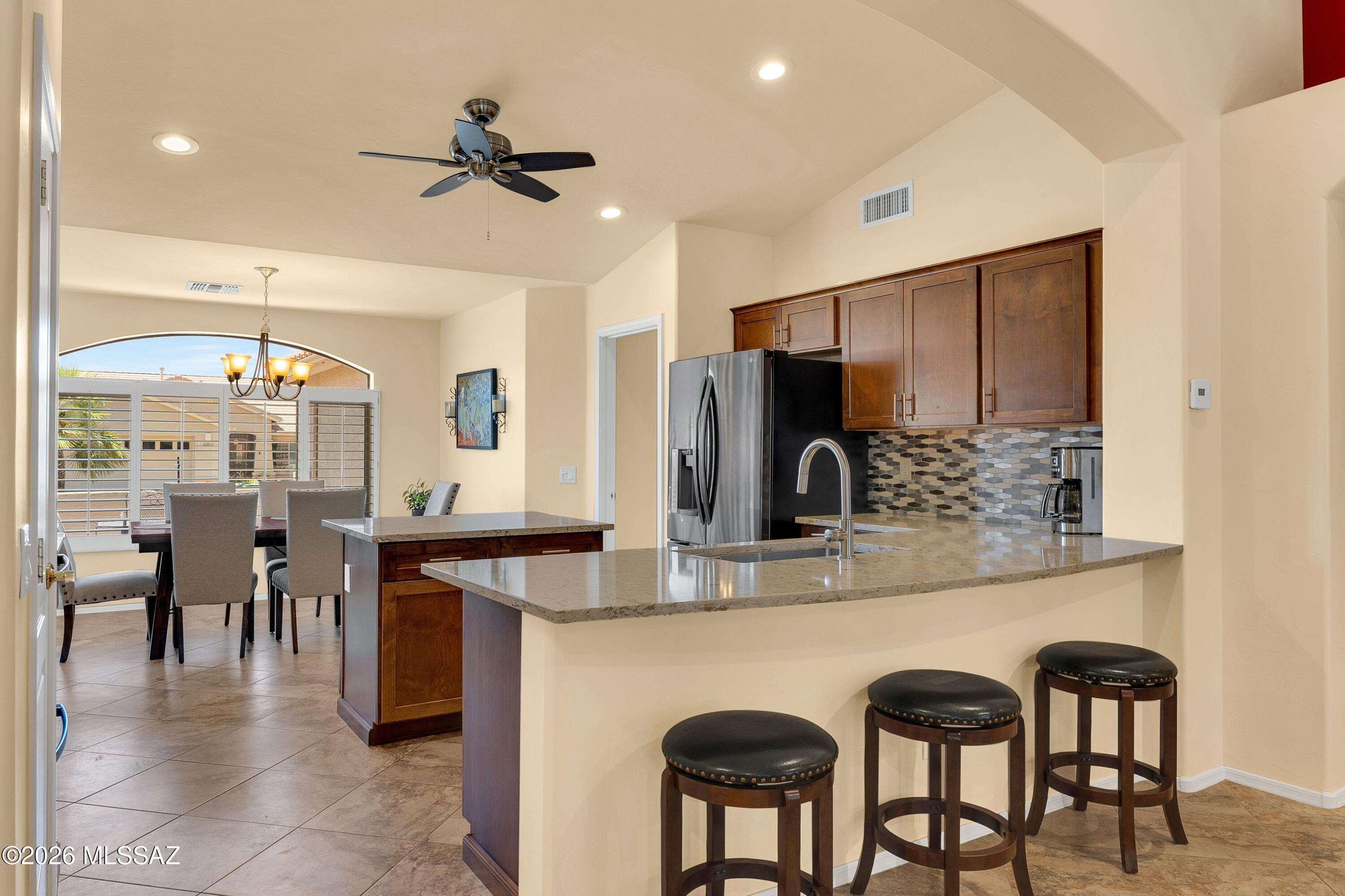 61852 East Sandlewood Road Tucson, AZ 85739 - Photo 14 of 50 Lowered counter & more seating