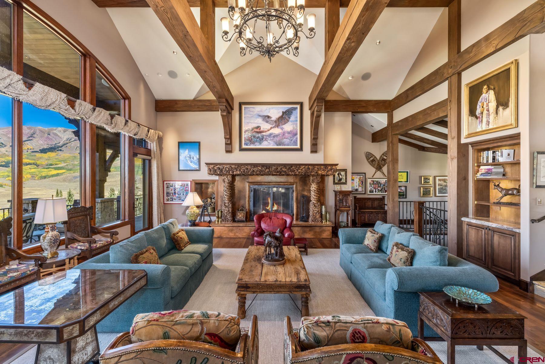 28 Kokanee Lane Crested Butte, CO 81225 - Photo 11 of 45 a living room with furniture fireplace and flat screen tv