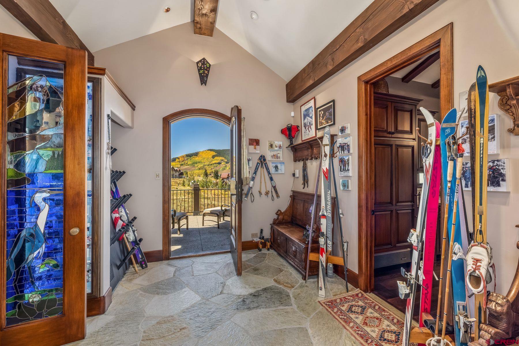 28 Kokanee Lane Crested Butte, CO 81225 - Photo 20 of 45 a view of walk in closet with clothes and shoes