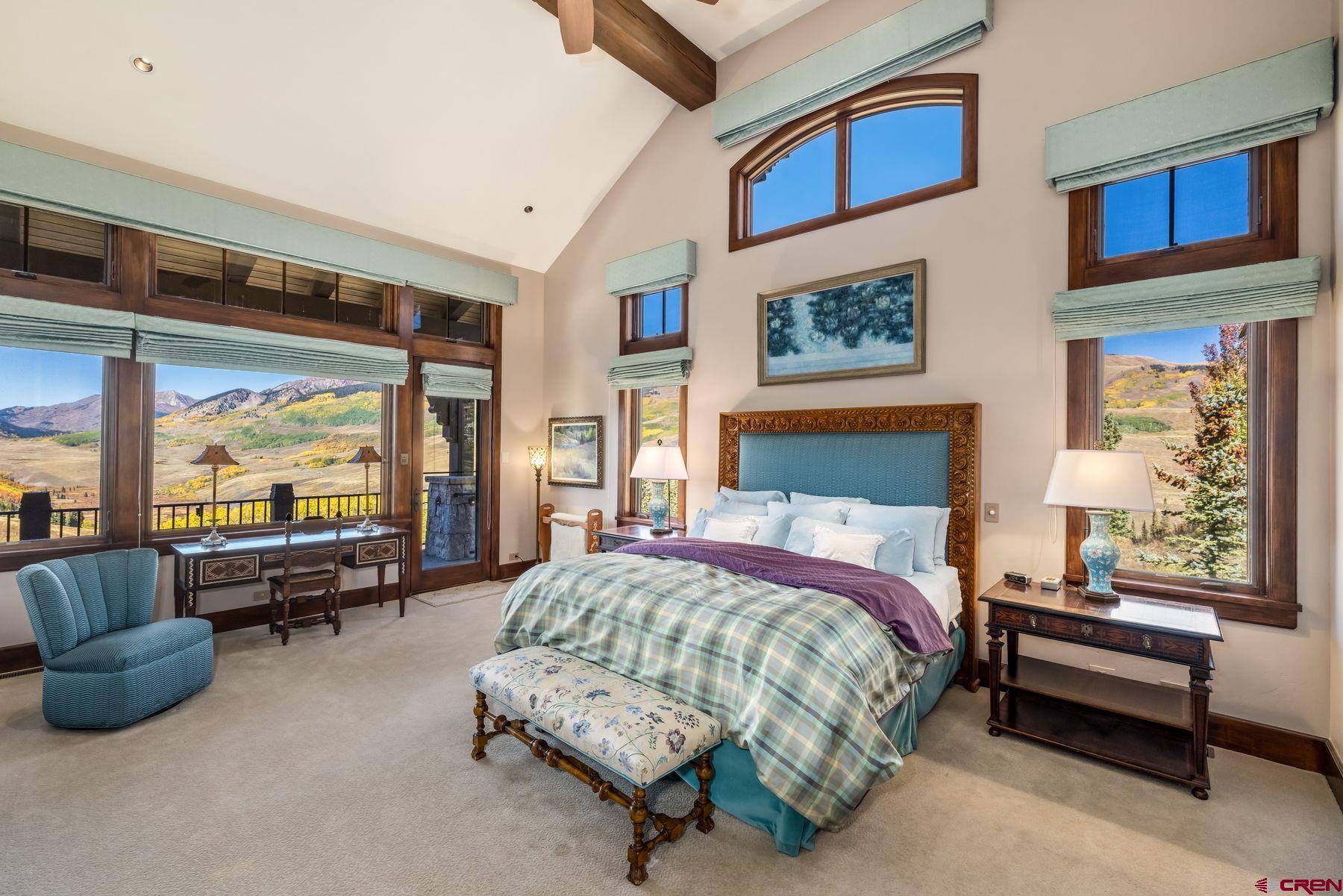 28 Kokanee Lane Crested Butte, CO 81225 - Photo 24 of 45 a bedroom with furniture and a large window