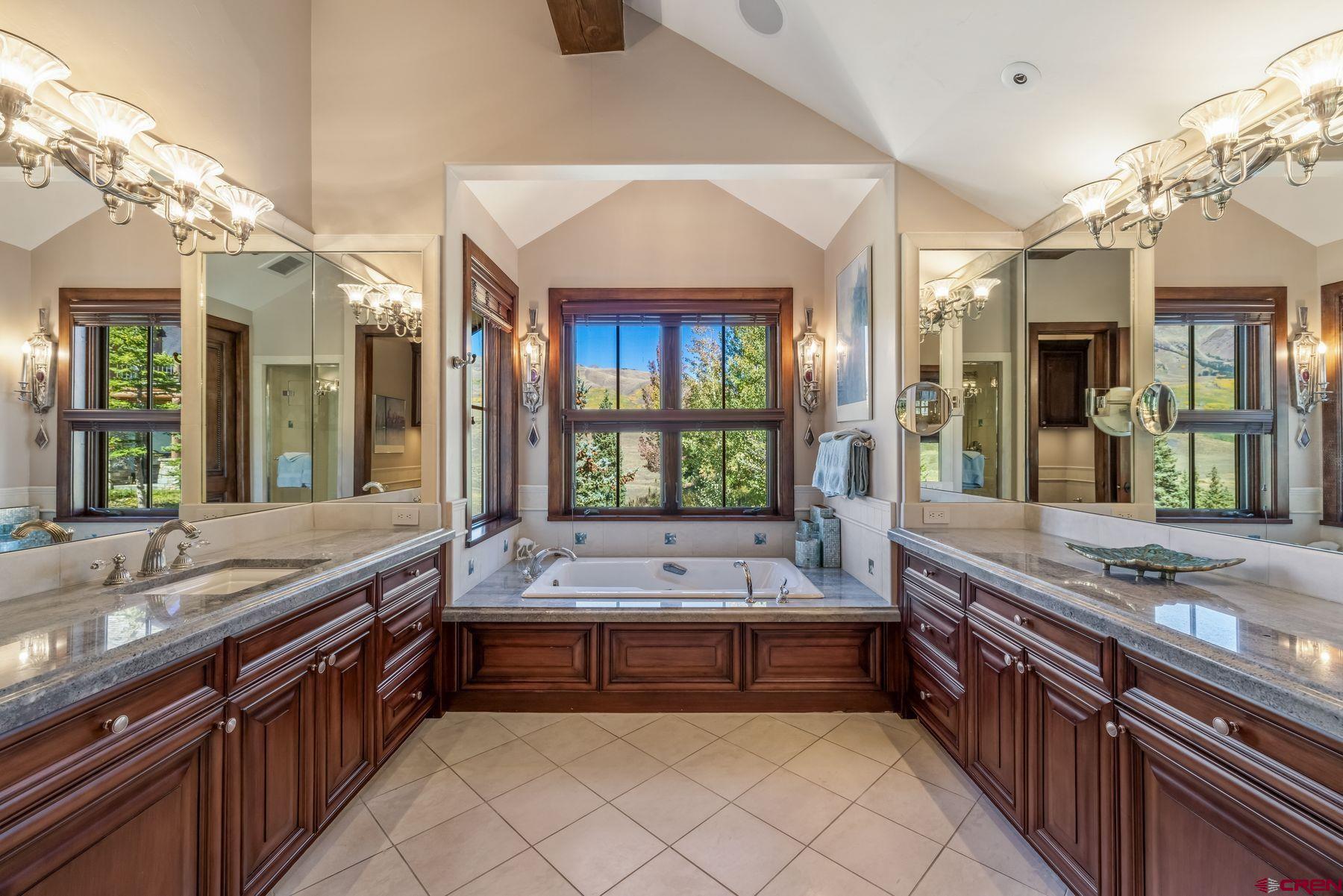 28 Kokanee Lane Crested Butte, CO 81225 - Photo 26 of 45 a large spacious bathroom with a large tub and sink