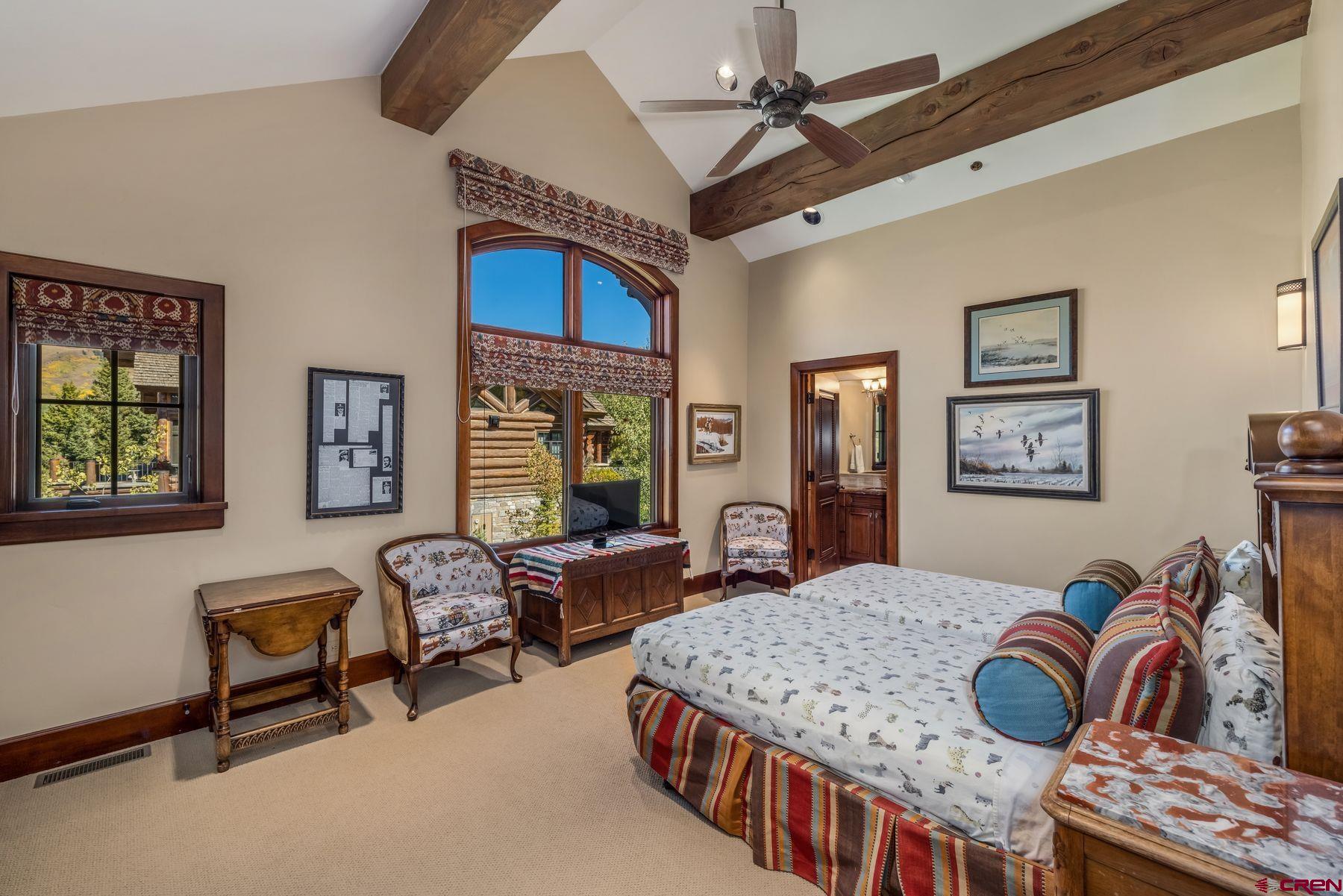 28 Kokanee Lane Crested Butte, CO 81225 - Photo 30 of 45 a bedroom with furniture and a window