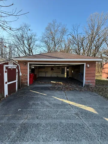 a view of yard covered with snow