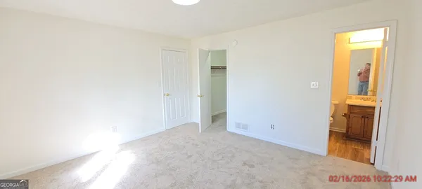 a bathroom with a toilet and a sink