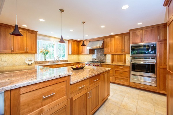 89 Black Oak Road Weston, MA 02493 - Photo 3 of 14 a kitchen with stainless steel appliances granite countertop a sink and cabinets