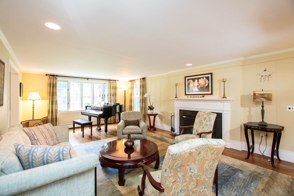 89 Black Oak Road Weston, MA 02493 - Photo 6 of 14 a living room with furniture and a fireplace