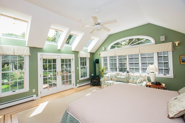 89 Black Oak Road Weston, MA 02493 - Photo 8 of 14 a large white building with a large windows