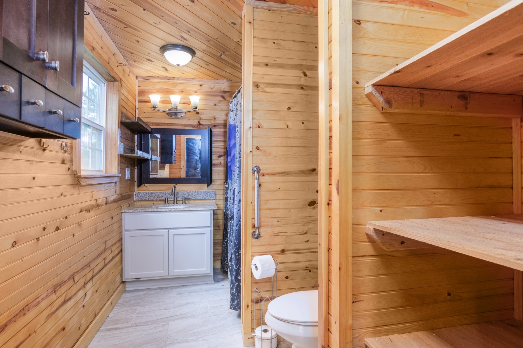 134 Magnolia Point Drive Houston, TX 77336 - Photo 18 of 31 a bathroom with a sink a toilet and shower