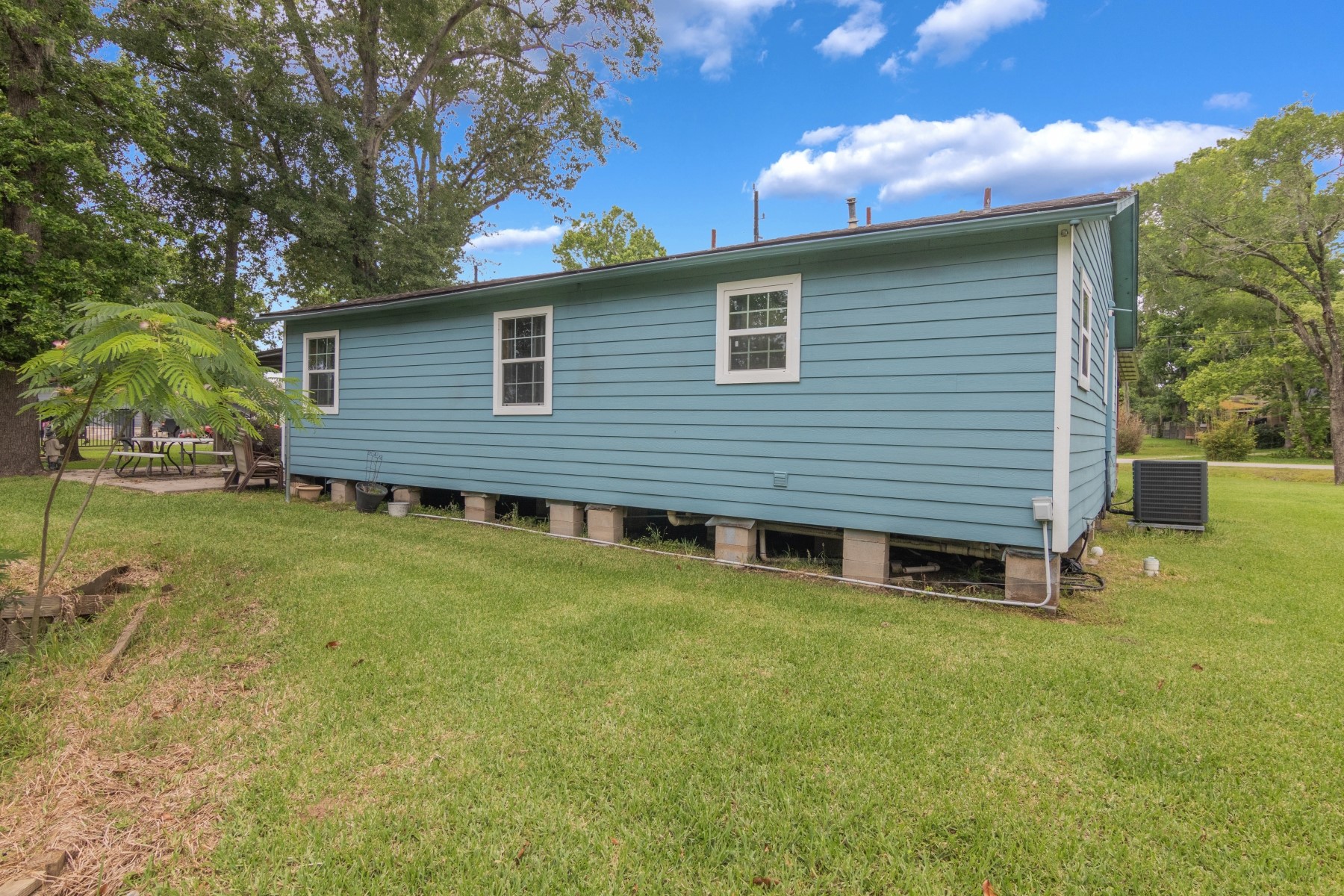 134 Magnolia Point Drive Houston, TX 77336 - Photo 20 of 31 a view of a house with a yard