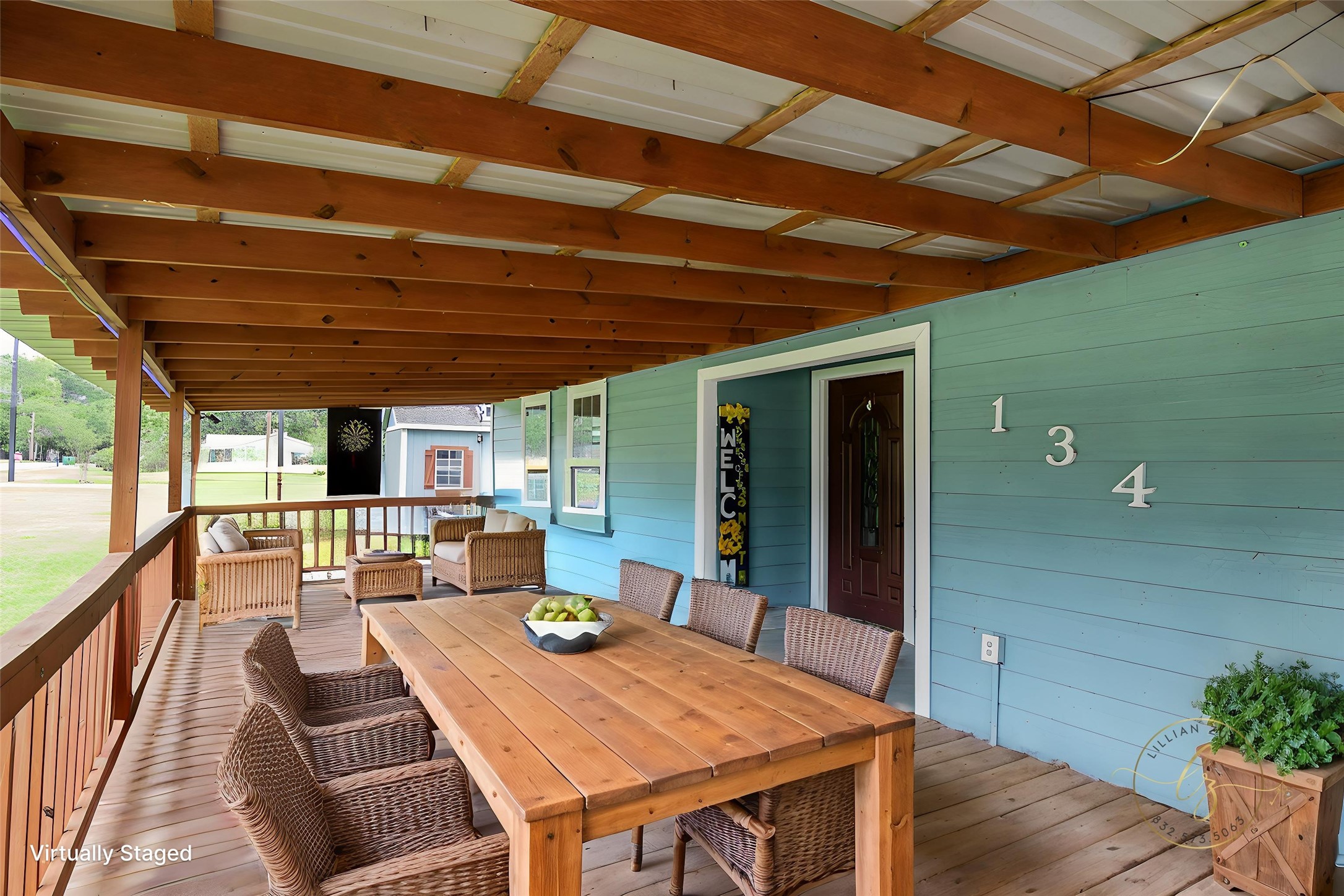 134 Magnolia Point Drive Houston, TX 77336 - Photo 2 of 31 a view of a patio with table and chairs a barbeque with wooden floor and fence