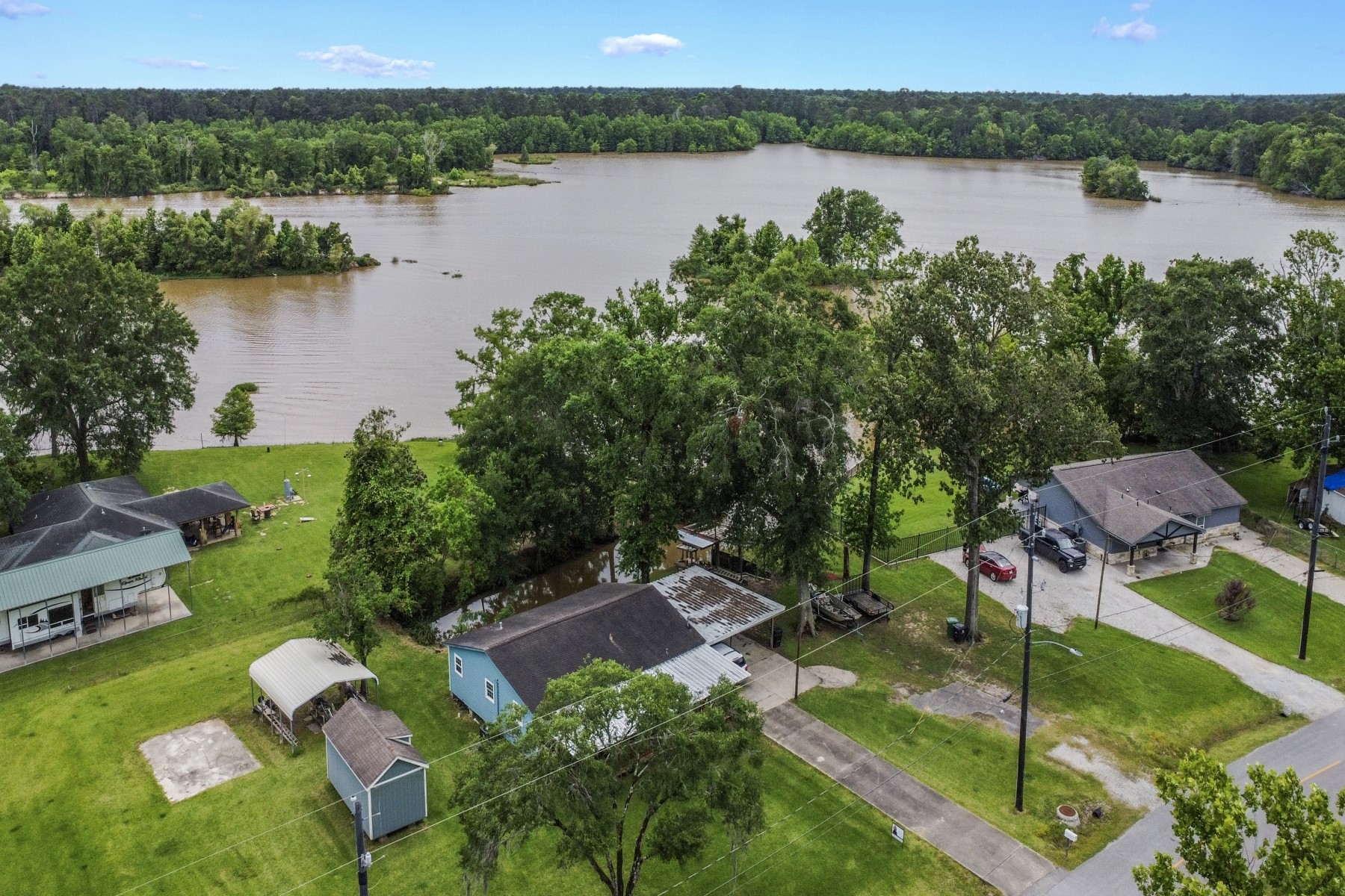134 Magnolia Point Drive Houston, TX 77336 - Photo 26 of 31 a view of lake with houses