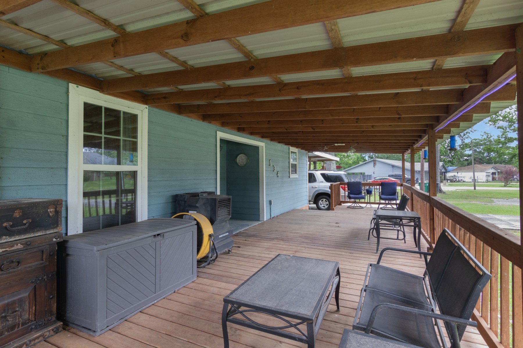 134 Magnolia Point Drive Houston, TX 77336 - Photo 3 of 31 a view of a patio with a table and chairs