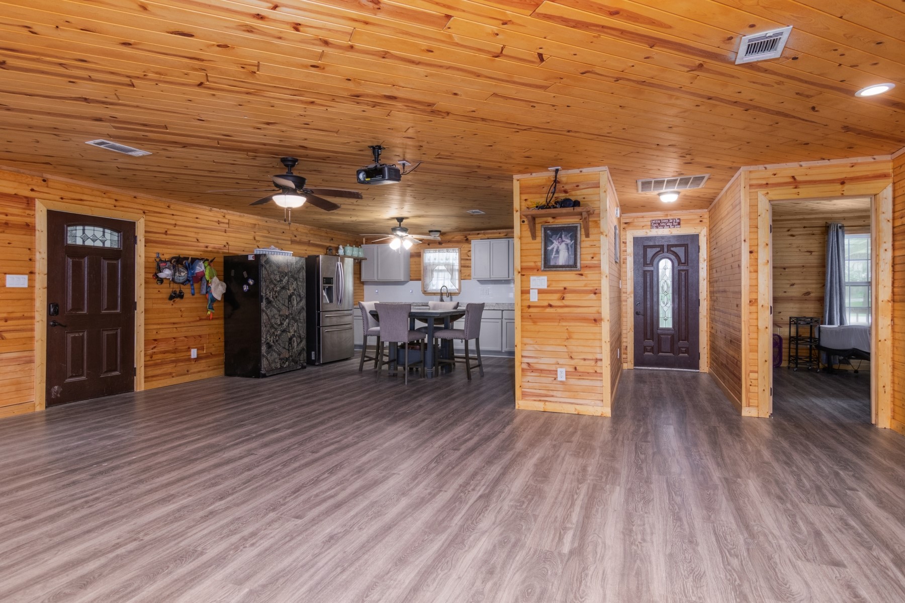 134 Magnolia Point Drive Houston, TX 77336 - Photo 5 of 31 a view of a room with wooden floor