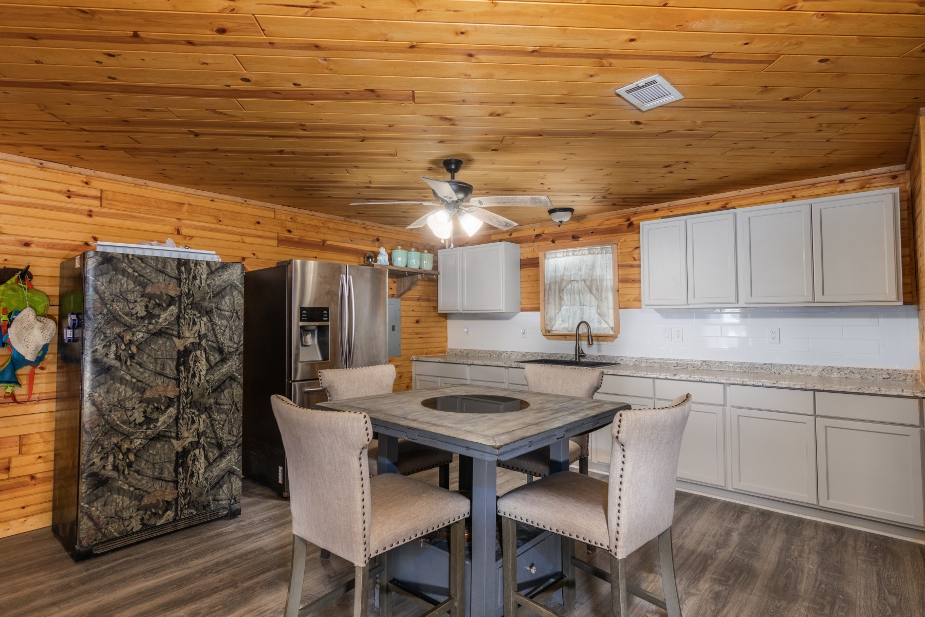 134 Magnolia Point Drive Houston, TX 77336 - Photo 8 of 31 a kitchen with a table chairs and wooden floor