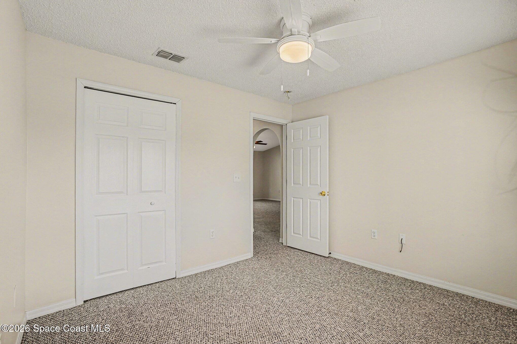 2268 Spring Creek Circle Palm Bay, FL 32905 - Photo 11 of 23 a view of an empty room