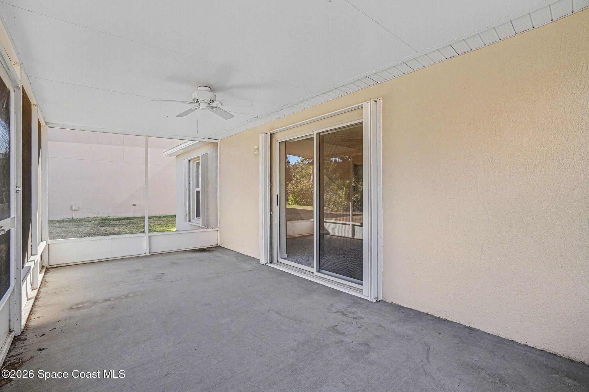 2268 Spring Creek Circle Palm Bay, FL 32905 - Photo 17 of 23 a view of an empty room with a window