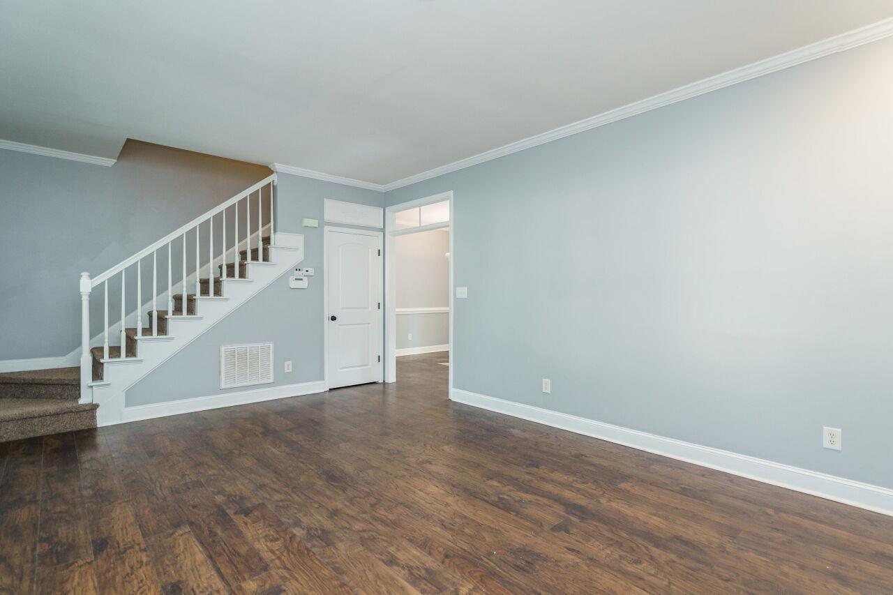 4202 Holt School Road Durham, NC 27704 - Photo 6 of 27 Picture yourself curled up by the fireplace with a good book, creating memories that will last a lifetime. Family Room