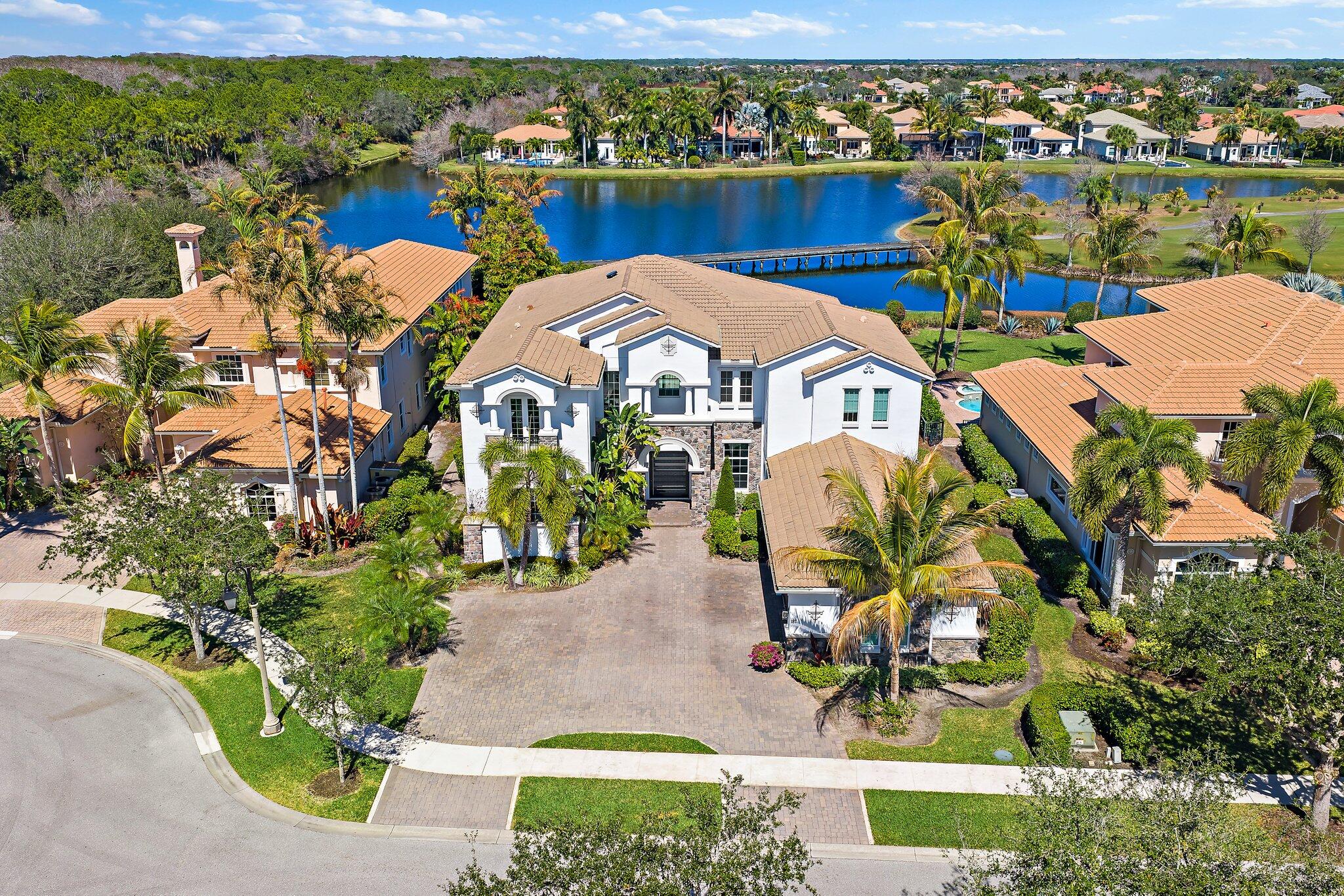 187 Elena Court Jupiter, FL 33478 - Photo 83 of 105 a picture of houses with outdoor space