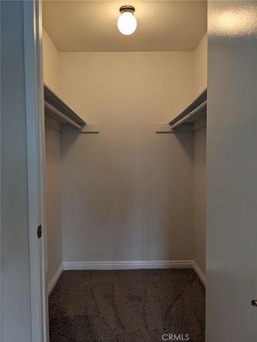 a bathroom with a granite countertop sink a toilet and bathtub