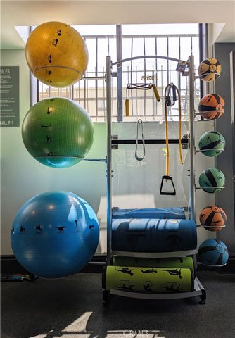 a bedroom with a bed and cabinets