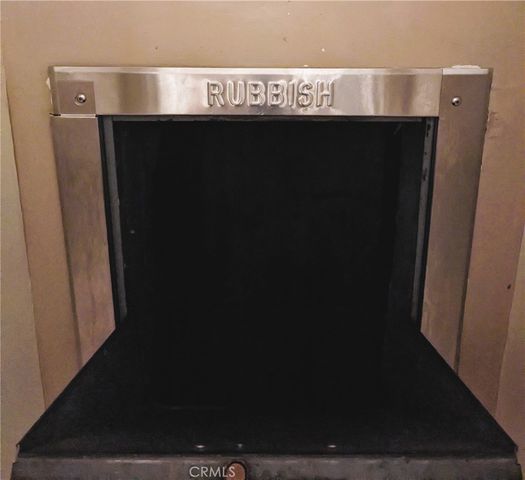 a bathroom with a granite countertop bathtub shower sink vanity and toilet