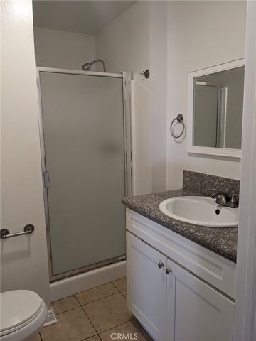 a view of parking garage with cars