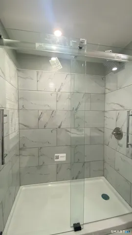 a view of room with wooden floor