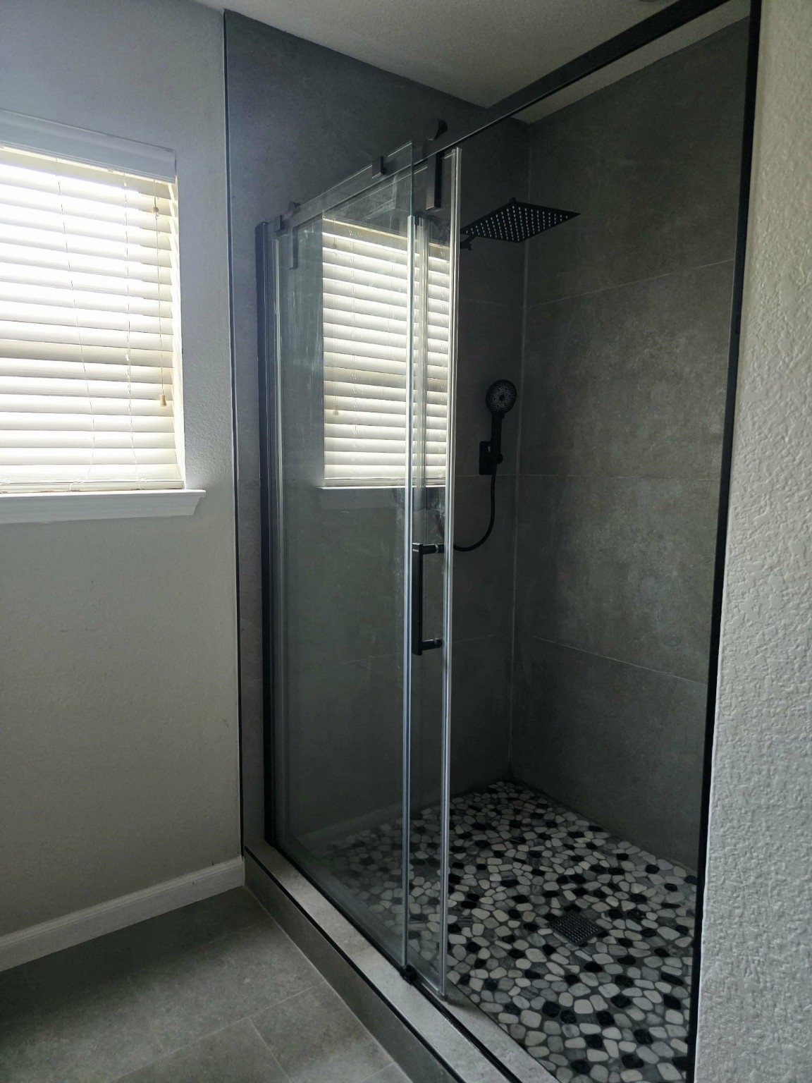 15618 Sweet Maple Court Houston, TX 77049 - Photo 15 of 23 a bathroom with a shower