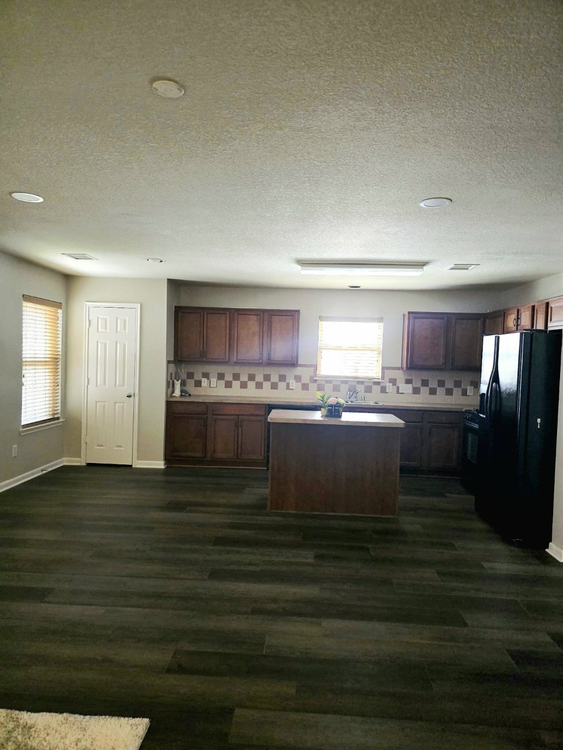 15618 Sweet Maple Court Houston, TX 77049 - Photo 5 of 23 a kitchen with a sink and cabinets