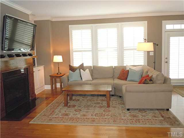 SPACIOUS AND OPEN TO THE KITCHEN...LOVE THE PLANTATION SHUTTERS Den/Family/Great Room