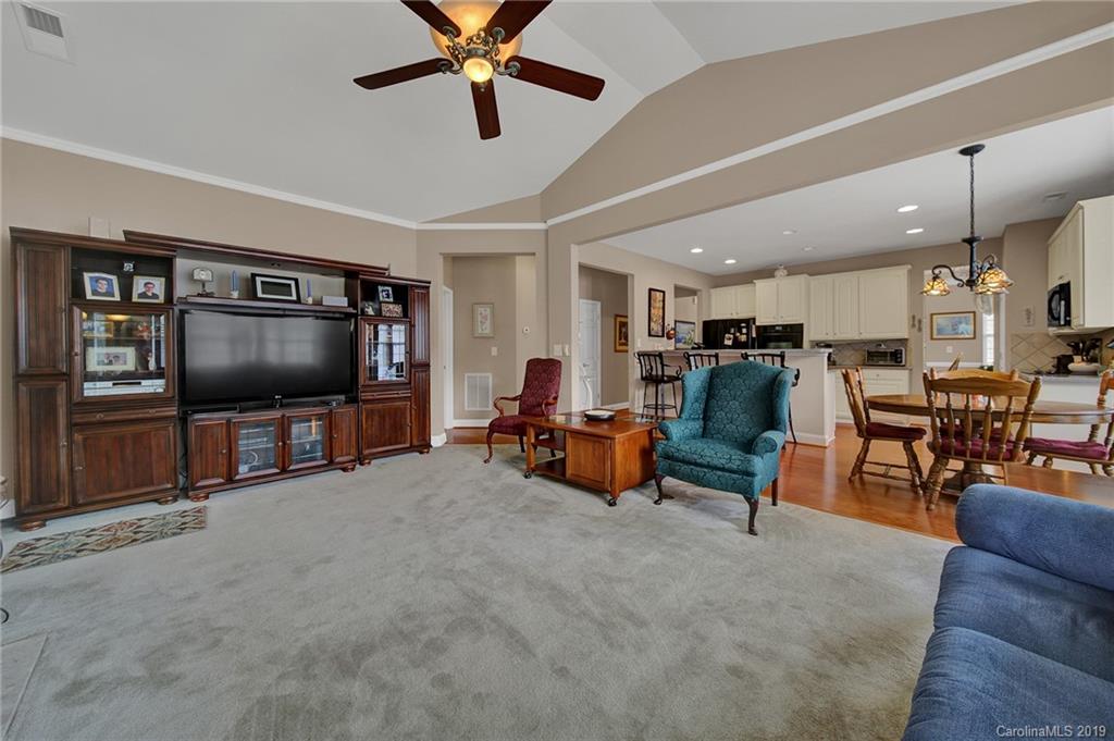 340 Garnet Court Fort Mill, SC 29708 - Photo 16 of 44 a living room with furniture and a flat screen tv
